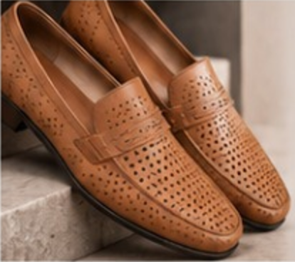 Perforated tan loafers